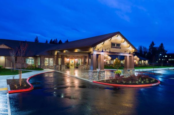 nighttime exterior view from the parking lot of hampton salmon creek memory care facility in vancouver washington